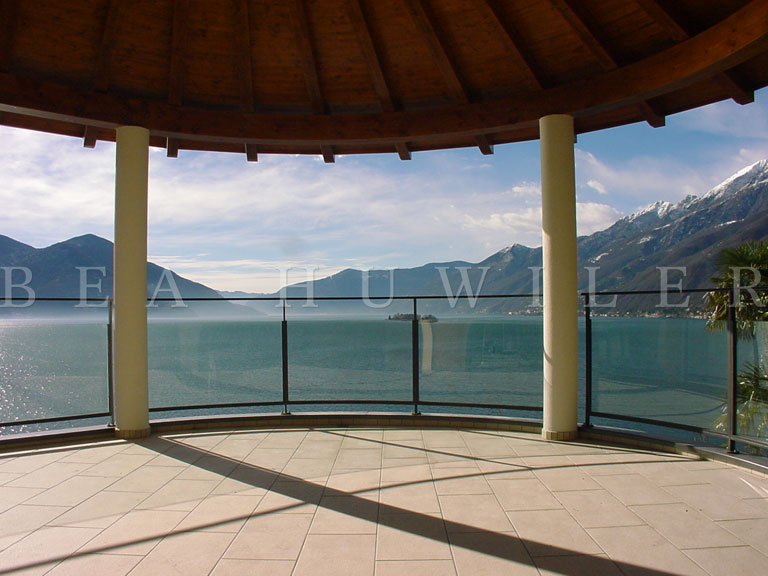 Harbor with boats and mountain backdrop